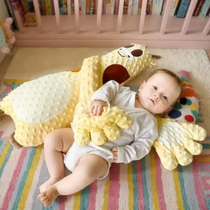 Soothing Baby Sleep Aid Pillow with a calming a remote control